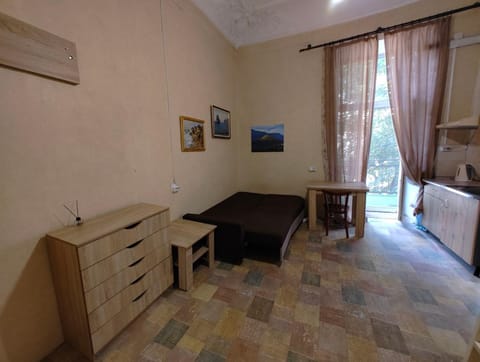 Property building, Bed, Living room, Seating area, Dining area, Bedroom