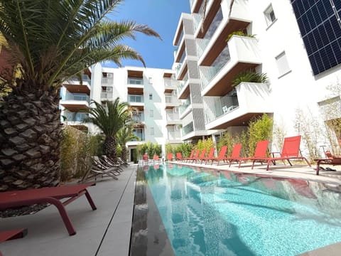Property building, Pool view, Swimming pool, sunbed