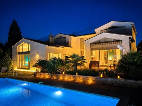 Patio, Night, Pool view, Swimming pool, sunbed