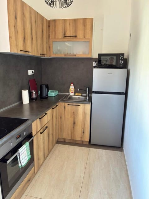 Kitchen or kitchenette, oven, stove