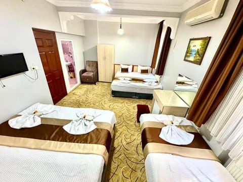 Bed, Living room, Photo of the whole room, Seating area, Bedroom, towels, air conditioner
