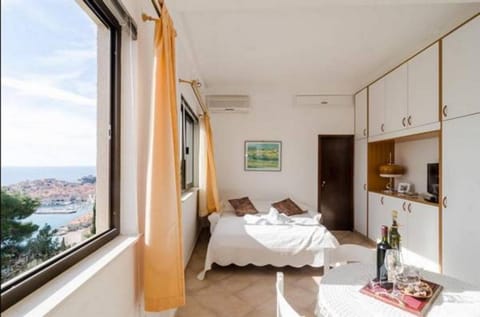 Bed, Living room, Dining area, Bedroom, City view