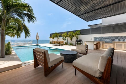 Patio, View (from property/room), Seating area, Pool view, Sea view, Swimming pool, sunbed