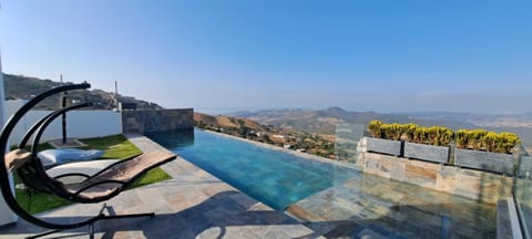 Natural landscape, Mountain view, Swimming pool, sunbed