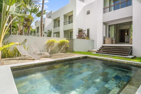 Property building, Patio, Swimming pool, sunbed