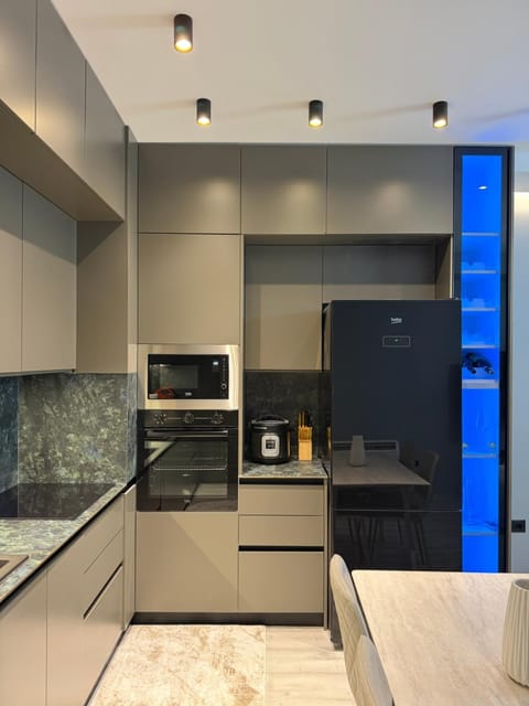 Kitchen or kitchenette, oven, stove