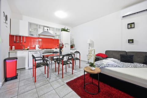 Bed, Living room, Seating area, Dining area, dishwasher, oven, stove, kitchen, air conditioner