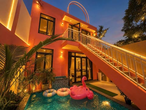 Property building, Patio, Night, Pool view, Swimming pool, sunbed