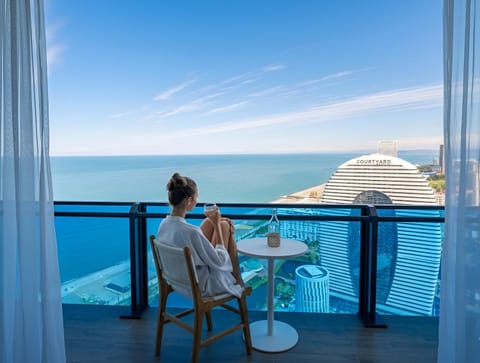 Day, People, Natural landscape, View (from property/room), Balcony/Terrace, Living room, Seating area, Dining area, Sea view, group of guests