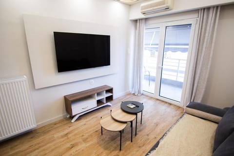 TV and multimedia, Living room, Seating area, air conditioner
