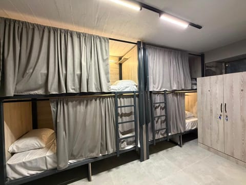 bunk bed, towels, wardrobe