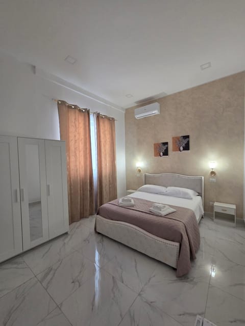 Bed, Photo of the whole room, Bedroom, towels, wardrobe, air conditioner