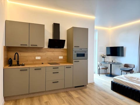 Kitchen or kitchenette, oven, stove