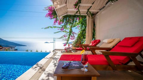 Patio, Sea view, Swimming pool, sunbed