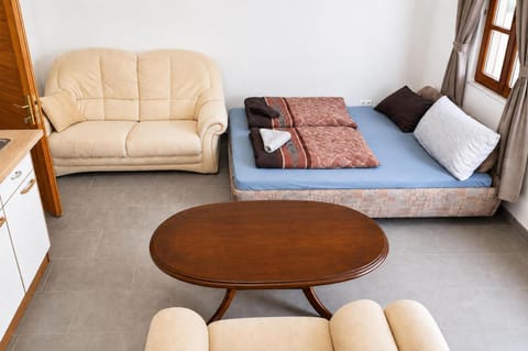 Bed, Seating area, Bedroom