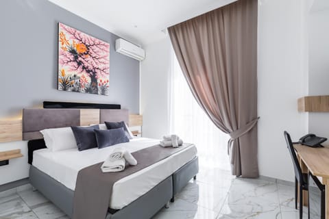 Photo of the whole room, Seating area, Bedroom, hair dresser, towels