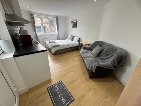 Bed, Living room, Seating area