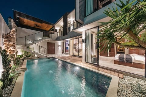 Property building, Patio, Night, Pool view, Swimming pool