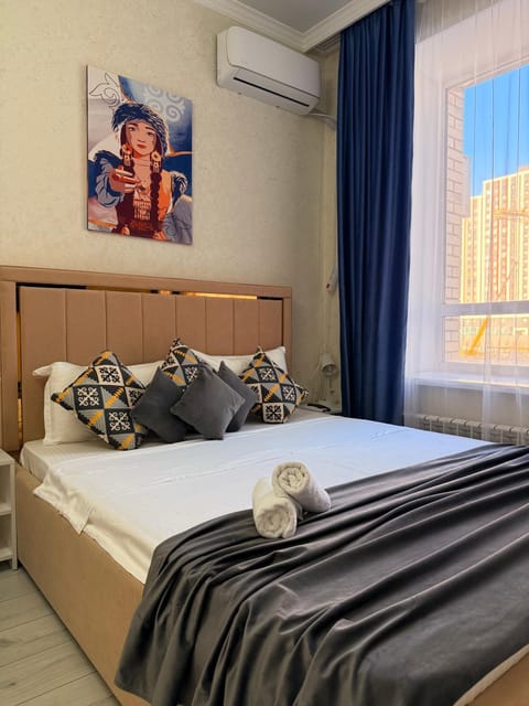 Bed, Photo of the whole room, Bedroom, towels, air conditioner