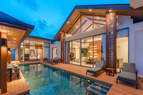 Property building, Patio, Pool view, Swimming pool, sunbed