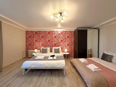 Bed, Photo of the whole room, Bedroom, hair dryier, towels, towels, wardrobe