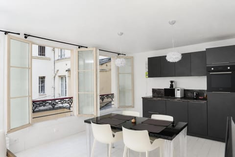 Facade/entrance, Dining area, microwave, oven, stove, kitchen