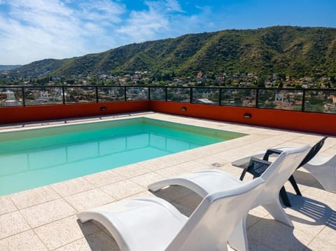 Patio, Day, Natural landscape, Mountain view, Pool view, Swimming pool, sunbed