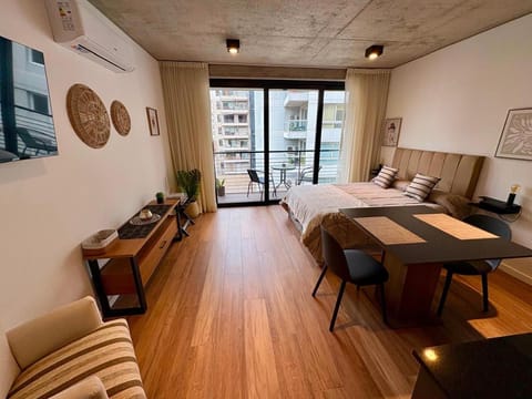 Bed, TV and multimedia, Living room, Photo of the whole room, Seating area, Bedroom