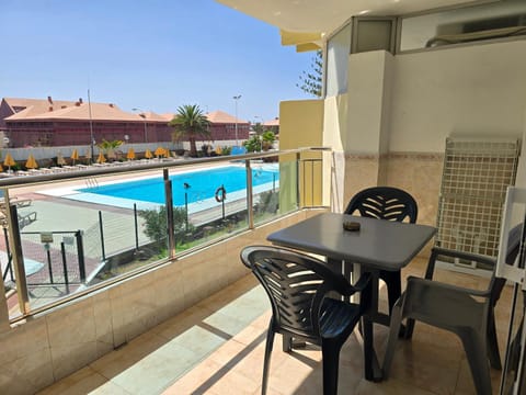 View (from property/room), Balcony/Terrace, Dining area, Pool view, Swimming pool