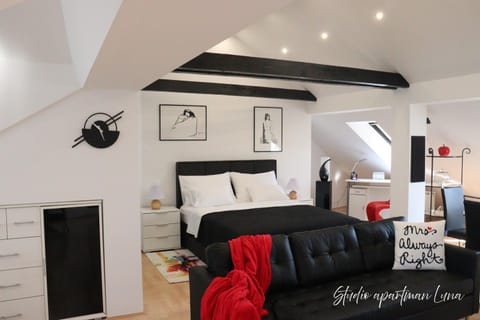 Bed, Living room, Seating area, Bedroom