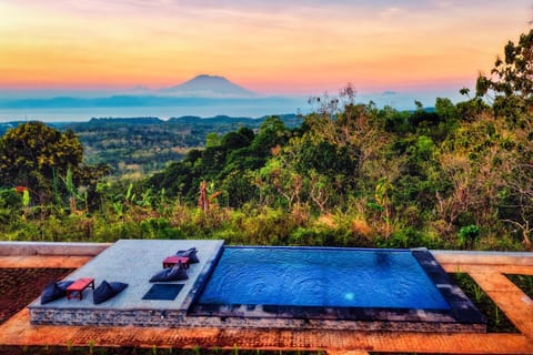 Natural landscape, Mountain view, Pool view, Sea view, Swimming pool, Sunset, sunbed