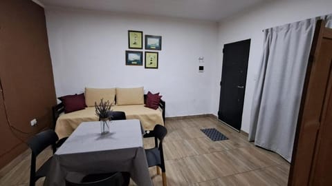 Bed, Living room, Seating area, Dining area