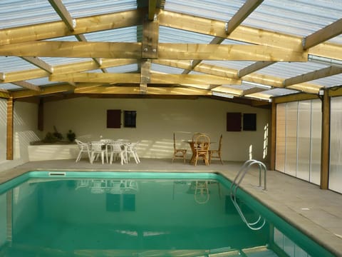 Property building, Living room, Swimming pool
