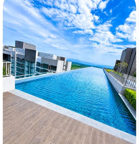 Property building, Nearby landmark, Day, Natural landscape, Pool view, Swimming pool