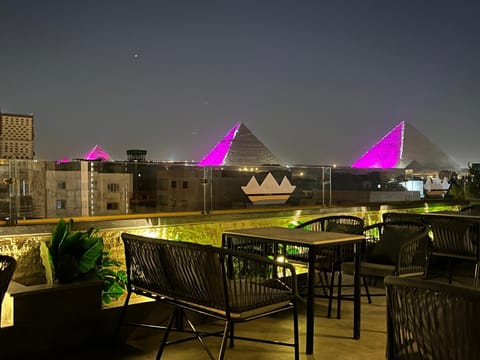 Restaurant/places to eat, Night, View (from property/room), City view, Landmark view, Mountain view, Street view