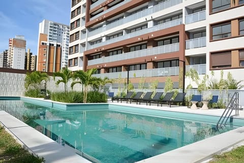 Property building, Day, Pool view, Swimming pool, sunbed
