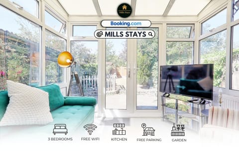 Communal lounge/ TV room, Property logo or sign, TV and multimedia, Living room, Seating area, Evening entertainment, Logo/Certificate/Sign, Text overlay, Certificate/Award