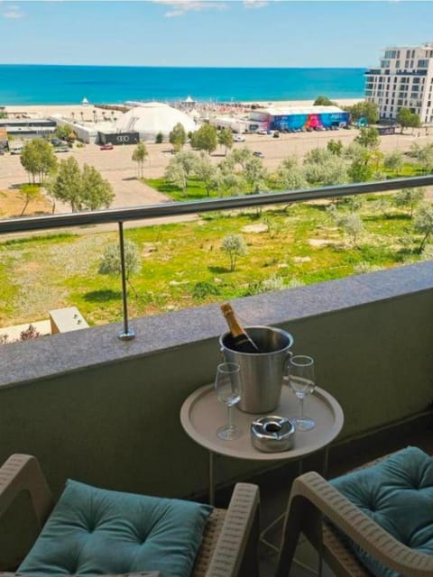 View (from property/room), Balcony/Terrace, Seating area, Dining area, Beach, Sea view