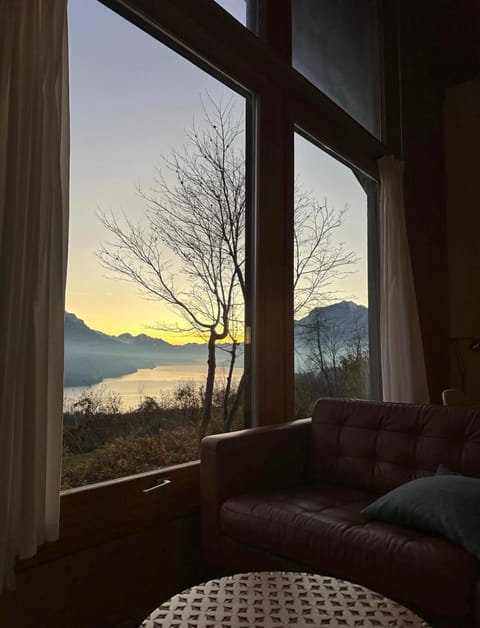Natural landscape, Living room, Seating area, Lake view, Mountain view