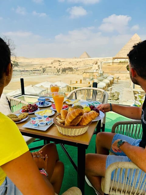 Restaurant/places to eat, Day, People, Natural landscape, View (from property/room), Balcony/Terrace, Food and drinks, Banquet/Function facilities, Dining area, Food, Guests, Mountain view, Sea view, Breakfast, Continental breakfast, Lunch, Dinner, Drinks, group of guests