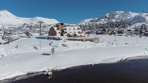 Property building, Nearby landmark, Day, Natural landscape, Winter, Lake view, Mountain view