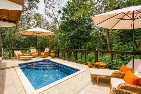 Patio, Natural landscape, Seating area, Pool view, Swimming pool, sunbed