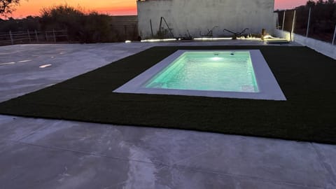 Property building, Living room, Swimming pool
