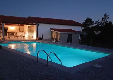 Property building, Night, Pool view, Swimming pool, sunbed