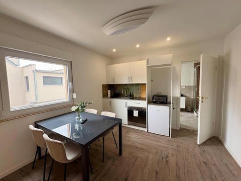 Kitchen or kitchenette, Seating area, Dining area, oven, stove, toaster