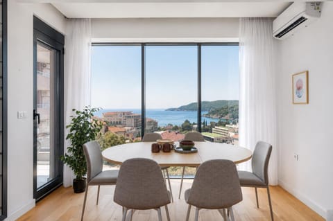 Living room, Seating area, Dining area, Sea view, air conditioner