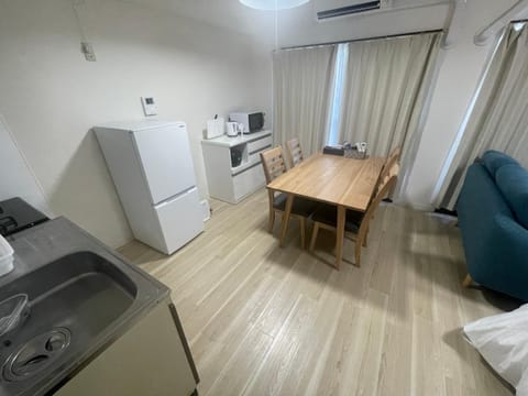 Kitchen or kitchenette, Living room, Dining area, air conditioner