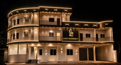 Property building, Night, Property logo or sign