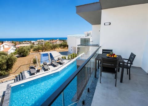Property building, Patio, Communal lounge/ TV room, Day, Natural landscape, View (from property/room), Balcony/Terrace, Balcony/Terrace, Living room, Seating area, Dining area, Evening entertainment, Pool view, Sea view, Swimming pool, Swimming pool, sunbed