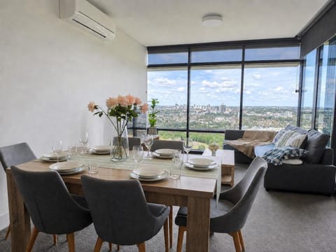 View (from property/room), Living room, Seating area, Dining area, air conditioner
